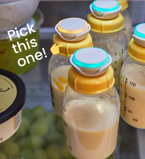 Image of 4 bottles of saved baby's milk in the fridge with an indicator of which should be used next. Each bottle has a LightTag on it. 3 are lit up teal and one is yellow. The yellow should be used next.