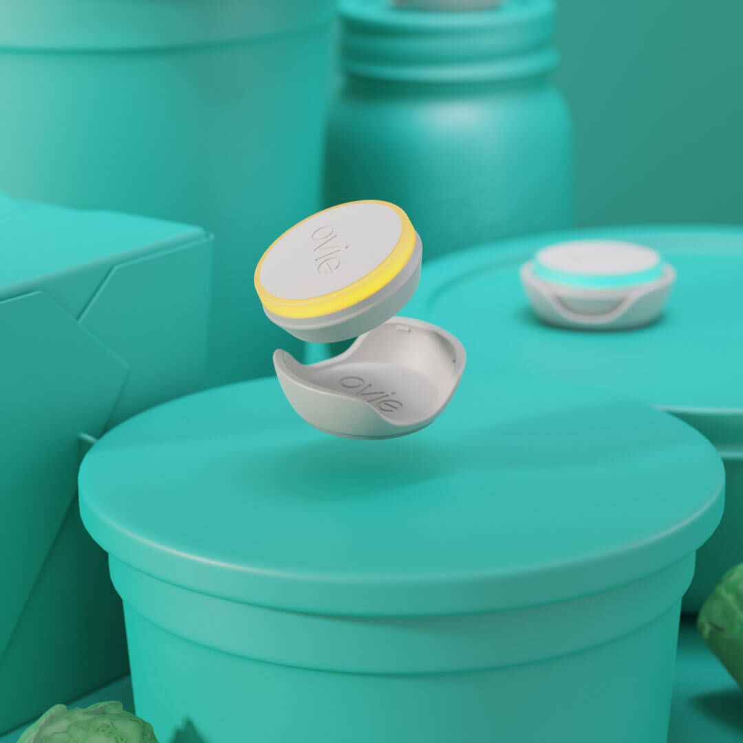 Closeup stylized rendering of Ovie LightTag floating over food container lid. Background and foods in rendering are all colored teal
