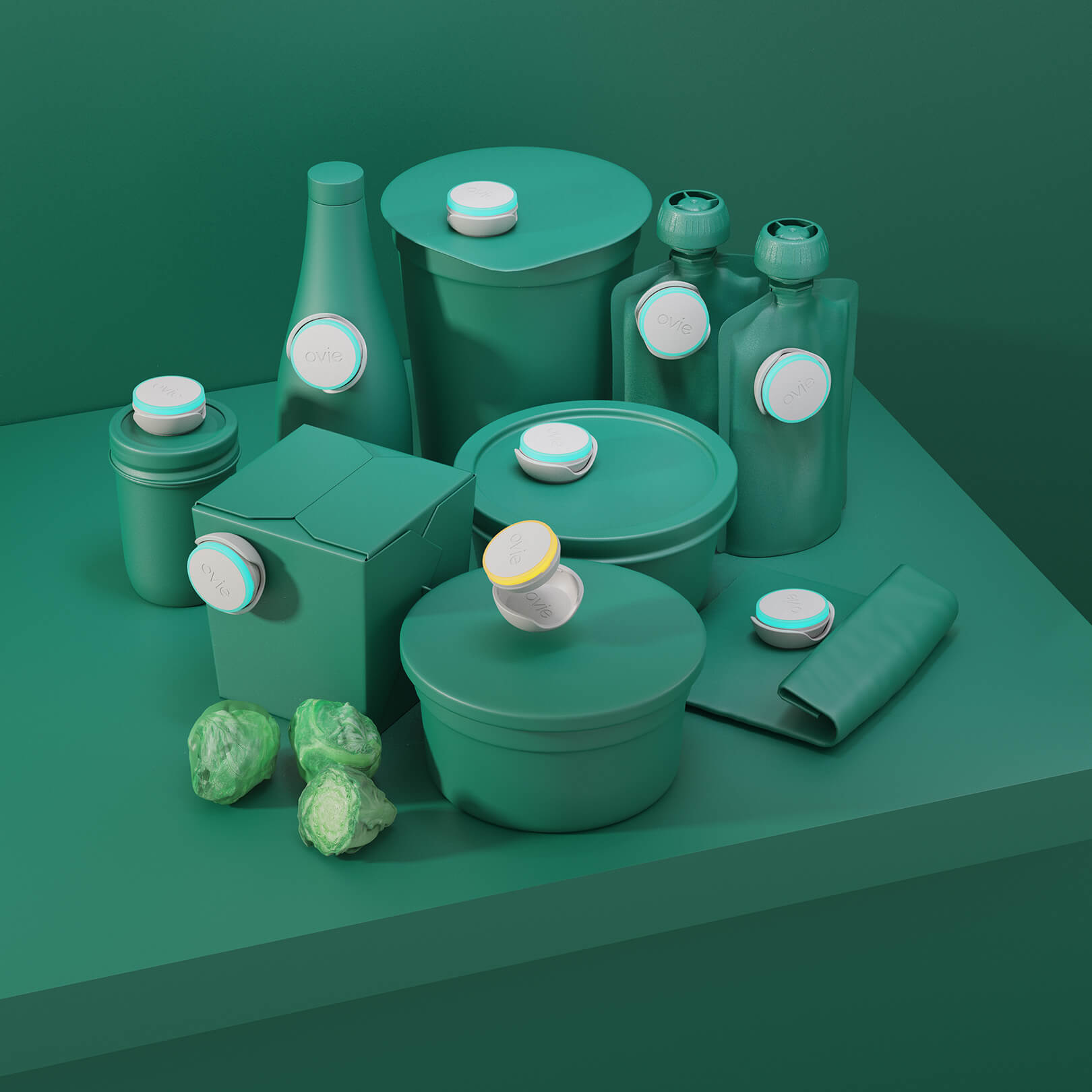 Stylized dark green image with 9 Ovie LightTags placed on various food-shaped containers that match the background. All LightTags are lit teal except for one which is lit yellow