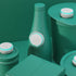 Stylized dark green-themed image highlighting Ovie LightTags on food containers that are also dark green