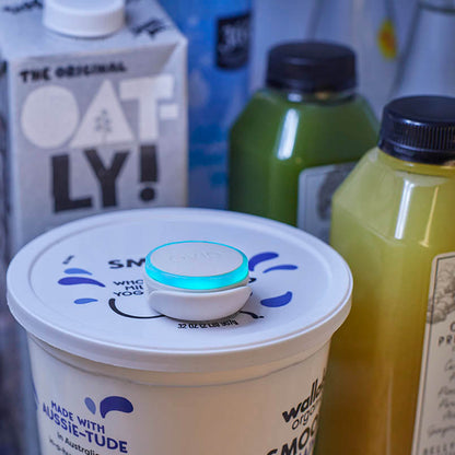 Close up photo of yogurt container with Ovie LightTag tracker on the top